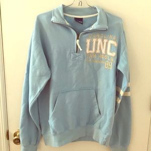 Sz med UNC Tar Heels blue sweatshirt
